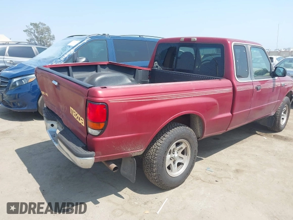 1998 Mazda B-Series Truck SE z VIN 4F4YR16X0WTM16695, wystawiony jako IAAI lot #42467653 z przebiegiem 73 495 mil mil oraz . Historia ofert i sprzedaży dostępna na DreamBid. Obrazek 4.