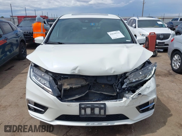 2019 Honda Odyssey Elite z VIN 5FNRL6H91KB110452, wystawiony jako IAAI lot #42630514 z przebiegiem 64 349 mil mil oraz . Historia ofert i sprzedaży dostępna na DreamBid. Obrazek 12.