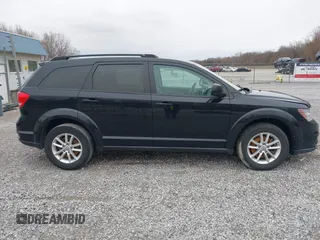 2014 Dodge Journey SXT with VIN 3C4PDCBG1ET142687, listed as a IAAI auction lot 41698232 with 170,521 mi miles. Bid and sale history available at carsss.com. Image 12.