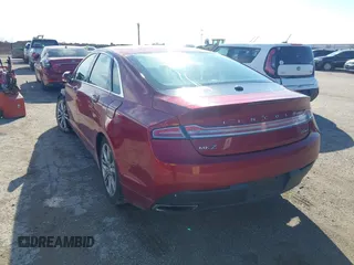 2015 Lincoln MKZ z VIN 3LN6L2G9XFR618075, wystawiony jako IAAI lot #41469247 z przebiegiem 152 966 mil mil oraz . Historia ofert i sprzedaży dostępna na DreamBid. Obrazek 3.
