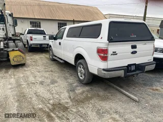 2014 Ford F-150 XL with VIN 1FTNF1CF5EKD79597, listed as a IAAI auction lot 41511800 with 100,758 mi miles. Bid and sale history available at carsss.com. Image 3.