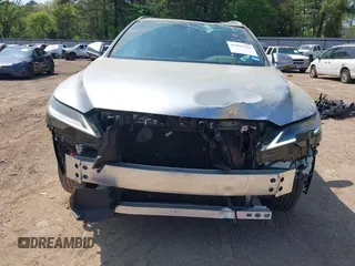 2024 Lexus RX 350 z VIN 2T2BAMBA9RC031068, wystawiony jako IAAI lot #41899128 z przebiegiem 17 583 mil mil oraz . Historia ofert i sprzedaży dostępna na DreamBid. Obrazek 6.