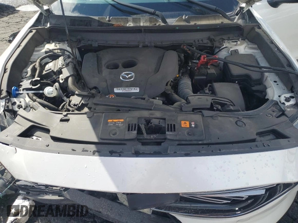 2021 Mazda CX-9 Touring with VIN JM3TCACY5M0527069, listed as a Copart auction lot 43014655 with 66,989 mi miles and Salvage title. Bid and sale history available at DreamBid. Image 12.