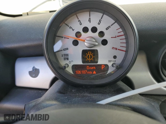 2012 MINI Hardtop with VIN WMWSU3C59CT542610, listed as a Copart auction lot 56720805 with 106,187 mi miles and Salvage Title. Bid and sale history available at DreamBid. Image 9.