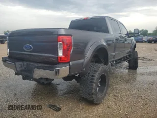 2018 Ford F-250 XL with VIN 1FT7W2B65JEB83300, listed as a Copart auction lot 55920255 with 104,125 mi miles and Salvage title. Bid and sale history available at DreamBid. Image 3.
