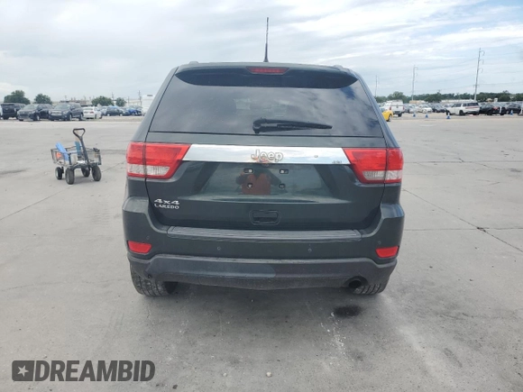 2011 Jeep Grand Cherokee Laredo z VIN 1J4RR4GG1BC520579, wystawiony jako Copart lot #60860794 z przebiegiem 196 271 mil mil oraz Szkoda całkowita • Salvage title. Historia ofert i sprzedaży dostępna na DreamBid. Obrazek 6.