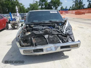 1996 Nissan Frontier XE z VIN 1N6SD11S0TC311270, wystawiony jako Copart lot #53870965 z przebiegiem 145 595 mil mil oraz Szkoda całkowita • Salvage title. Historia ofert i sprzedaży dostępna na DreamBid. Obrazek 5.