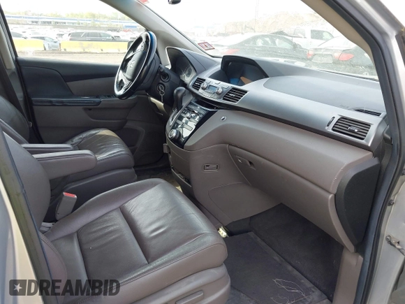 2011 Honda Odyssey EX-L with VIN 5FNRL5H61BB067456, listed as a IAAI auction lot 42131999 with 150,358 mi miles and . Bid and sale history available at carsss.com. Image 5.