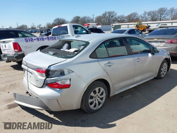 2021 Toyota Corolla LE with VIN 5YFEPMAE2MP166647, listed as a IAAI auction lot 41670097 with 143,557 mi miles. Bid and sale history available at carsss.com. Image 4.