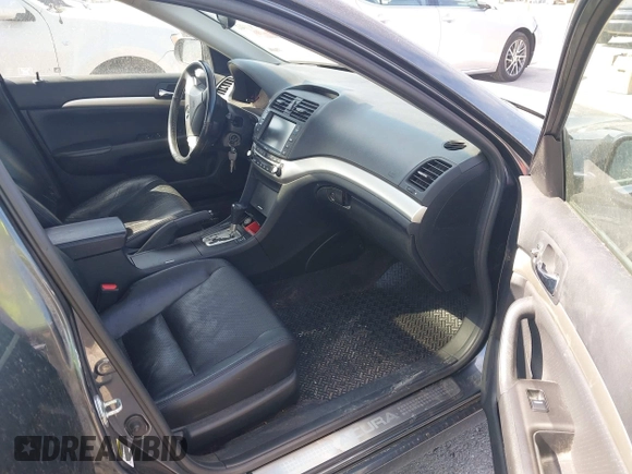 2004 Acura TSX w/Navigation with VIN JH4CL96974C017539, listed as a IAAI auction lot 41918507 with 168,557 mi miles. Bid and sale history available at carsss.com. Image 5.