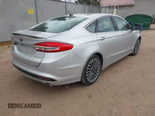 2017 Ford Fusion Titanium with VIN 3FA6P0SU2HR153423, listed as a IAAI auction lot 42029438 with 106,596 mi miles and . Bid and sale history available at DreamBid. Image 4.