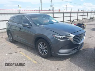 2019 Mazda CX-9 Sport z VIN JM3TCABY0K0327361, wystawiony jako IAAI lot #42362232 z przebiegiem 264 699 mil mil oraz . Historia ofert i sprzedaży dostępna na DreamBid. Obrazek 1.