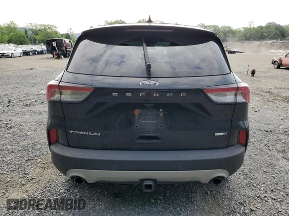 2020 Ford Escape Titanium с VIN 1FMCU9J97LUA20595, выставлен на аукционе Copart как лот 59476745 с пробегом 74 518 миль миль и Списание • Salvage title. История ставок и продаж доступна на DreamBid. Изображение 6.