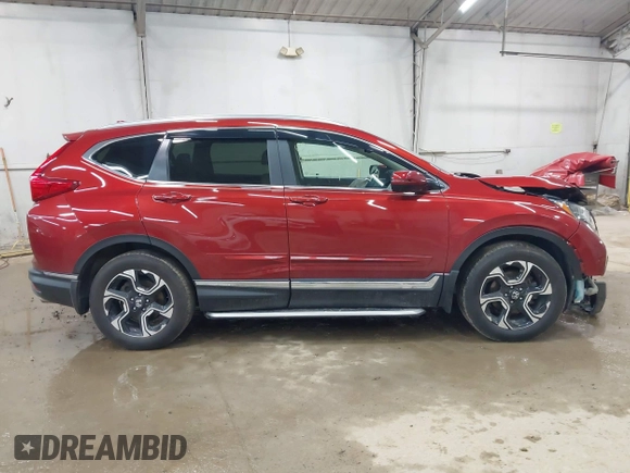 2017 Honda CR-V Touring with VIN 2HKRW2H95HH610401, listed as a IAAI auction lot 42177024 with 42,494 mi miles and . Bid and sale history available at carsss.com. Image 13.