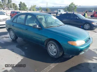 1997 Ford Escort LX with VIN 1FALP13P3VW125396, listed as a IAAI auction lot 42036066 with 132,239 mi miles. Bid and sale history available at carsss.com. Image 1.