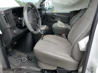 2012 Chevrolet Express Passenger 1LT with VIN 1GAZG1FG5C1183156, listed as a Copart auction lot 65655454 with 130,915 mi miles and Salvage Title. Bid and sale history available at carsss.com. Image 7.
