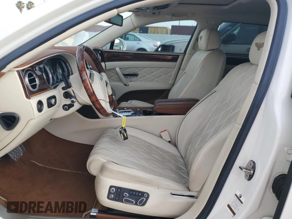 2015 Bentley Flying Spur z VIN SCBEC9ZAXFC041601, wystawiony jako Copart lot #62028895 z przebiegiem 43 943 mil mil oraz Szkoda całkowita • Salvage title. Historia ofert i sprzedaży dostępna na DreamBid. Obrazek 7.