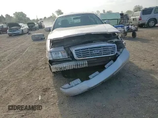 2011 Ford Crown Victoria LX z VIN 2FABP7EVXBX155506, wystawiony jako Copart lot #56899375 z przebiegiem 177 956 mil mil oraz Szkoda całkowita • Salvage title. Historia ofert i sprzedaży dostępna na DreamBid. Obrazek 13.