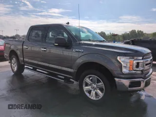2019 Ford F-150 XL with VIN 1FTEW1E53KFB57102, listed as a Copart auction lot 61633055 with 86,949 mi miles and Salvage title. Bid and sale history available at DreamBid. Image 4.