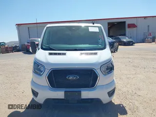 2023 Ford Transit Passenger XL with VIN 1FBAX2Y89PKA45043, listed as a IAAI auction lot 39253709 with 54,625 mi miles and . Bid and sale history available at DreamBid. Image 12.
