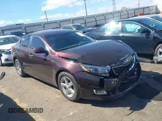 2015 Kia Optima LX z VIN 5XXGM4A71FG463939, wystawiony jako IAAI lot #41838294 z przebiegiem 70 274 mil mil oraz . Historia ofert i sprzedaży dostępna na DreamBid. Obrazek 1.
