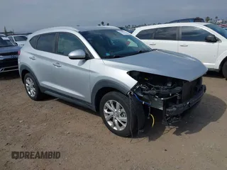 2019 Hyundai Tucson Value z VIN KM8J3CA46KU962082, wystawiony jako IAAI lot #42160288 z przebiegiem 92 887 mil mil oraz . Historia ofert i sprzedaży dostępna na DreamBid. Obrazek 1.