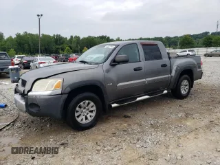 2006 Mitsubishi Raider Duro Cross z VIN 1Z7HC38K76S537788, wystawiony jako Copart lot #63922994 z przebiegiem 331 015 mil mil oraz Nie do naprawy • Non repairable. Historia ofert i sprzedaży dostępna na DreamBid. Obrazek 1.