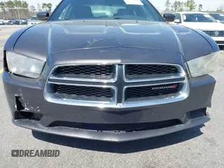 2014 Dodge Charger SE with VIN 2C3CDXBG0EH216023, listed as a IAAI auction lot 41827307 with 243,107 mi miles. Bid and sale history available at carsss.com. Image 17.