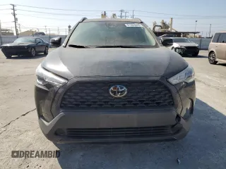 2023 Toyota Corolla Cross LE with VIN 7MUCAABG1PV050123, listed as a Copart auction lot 61384845 with 30,712 mi miles and Salvage title. Bid and sale history available at DreamBid. Image 5.