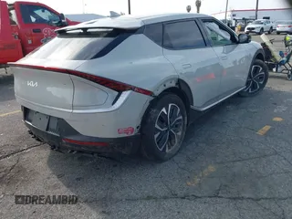 2024 Kia EV6 Wind with VIN KNDC34LA1R5214852, listed as a IAAI auction lot 41818262 with 14,950 mi miles and . Bid and sale history available at DreamBid. Image 4.
