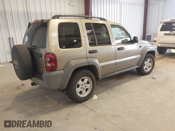 2005 Jeep Liberty Sport with VIN 1J4GL48K85W717487, listed as a IAAI auction lot 42082744 with 103,888 mi miles. Bid and sale history available at carsss.com. Image 4.