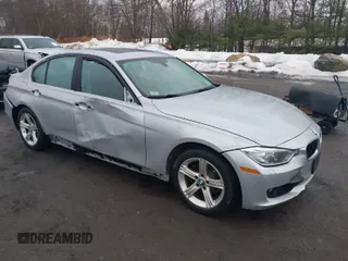 2013 BMW 3 Series 328i xDrive with VIN WBA3B5C58DF594087, listed as a IAAI auction lot 41710362 with 185,994 mi miles. Bid and sale history available at carsss.com. Image 1.
