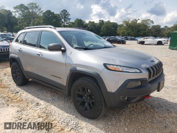 2016 Jeep Cherokee Trailhawk z VIN 1C4PJMBSXGW121272, wystawiony jako Copart lot #61769505 z przebiegiem 119 353 mil mil oraz Szkoda całkowita • Salvage title. Historia ofert i sprzedaży dostępna na DreamBid. Obrazek 4.