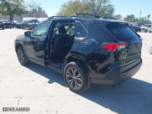 2024 Toyota RAV4 Hybrid XLE Premium with VIN JTMB6RFV9RD137409, listed as a IAAI auction lot 41758774 with 5,826 mi miles. Bid and sale history available at carsss.com. Image 3.