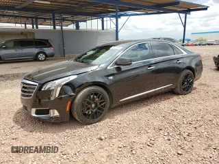 2019 Cadillac XTS Luxury z VIN 2G61M5S36K9160506, wystawiony jako Copart lot #56029395 z przebiegiem 158 567 mil mil oraz Szkody całkowita. Historia ofert i sprzedaży dostępna na DreamBid. Obrazek 1.
