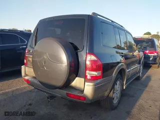 2005 Mitsubishi Montero LTD with VIN JA4MW51S55J001203, listed as a IAAI auction lot 41915695 with 211,868 mi miles. Bid and sale history available at carsss.com. Image 4.