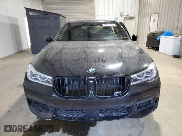 2016 BMW 7 Series 750i with VIN WBA7F0C5XGGL99017, listed as a Copart auction lot 84934504 with 0 mi miles and Salvage Title. Bid and sale history available at carsss.com. Image 5.