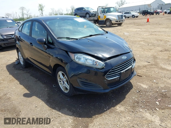 2019 Ford Fiesta SE with VIN 3FADP4BJ2KM165435, listed as a IAAI auction lot 42077508 with 118,784 mi miles. Bid and sale history available at carsss.com. Image 1.