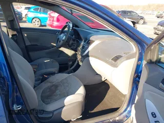 2015 Hyundai Accent GLS with VIN KMHCT4AE6FU916149, listed as a IAAI auction lot 41082268 with 153,219 mi miles. Bid and sale history available at carsss.com. Image 5.