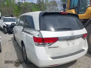 2016 Honda Odyssey EX-L with VIN 5FNRL5H68GB128552, listed as a IAAI auction lot 41947677 with 213,255 mi miles and . Bid and sale history available at DreamBid. Image 3.