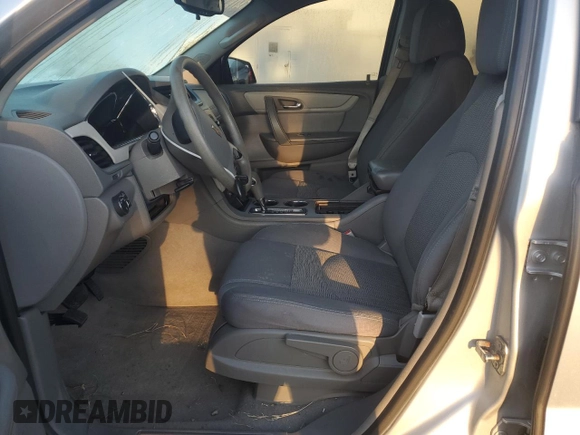 2013 Chevrolet Traverse LS with VIN 1GNKVFED9DJ124042, listed as a Copart auction lot 83077294 with 102,812 mi miles and Salvage Title. Bid and sale history available at DreamBid. Image 7.