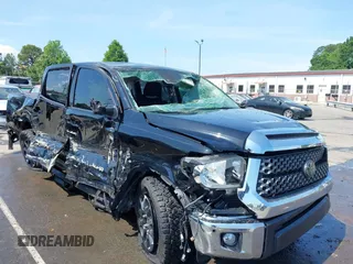 2021 Toyota Tundra SR5 with VIN 5TFDY5F17MX991623, listed as a IAAI auction lot 42173943 with 61,521 mi miles and . Bid and sale history available at DreamBid. Image 1.