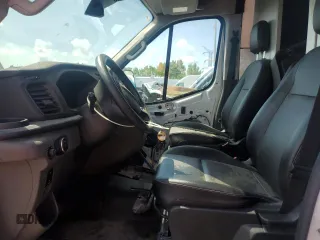 2023 Ford Transit Cargo with VIN 1FTBR1X87PKB07660, listed as a Copart auction lot 63852975 with 37,357 mi miles and Salvage title. Bid and sale history available at DreamBid. Image 7.