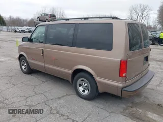 1998 Chevrolet Astro with VIN 1GNEL19W0WB198965, listed as a IAAI auction lot 41986890 with 107,881 mi miles. Bid and sale history available at carsss.com. Image 3.