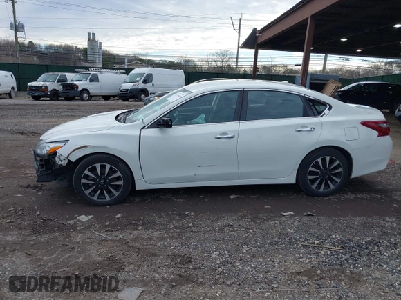 2018 Nissan Altima SR with VIN 1N4AL3APXJC283392, listed as a IAAI auction lot 41214643 with 126,720 mi miles and . Bid and sale history available at DreamBid. Image 14.