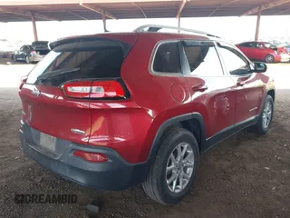 2017 Jeep Cherokee Latitude with VIN 1C4PJMCB4HW570754, listed as a IAAI auction lot 42159375 with 154,887 mi miles. Bid and sale history available at carsss.com. Image 4.