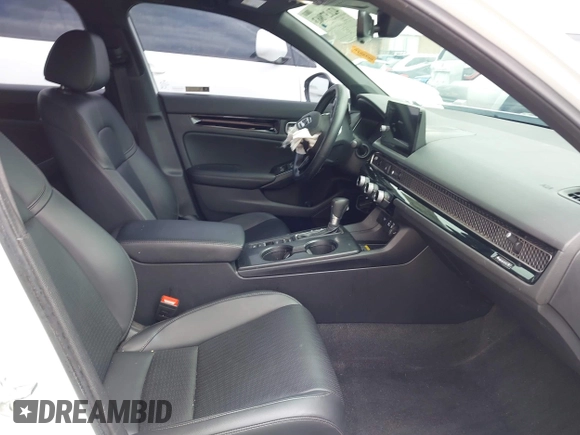 2022 Honda Civic Sport Touring z VIN 19XFL1H8XNE009448, wystawiony jako IAAI lot #42137863 z przebiegiem 58 594 mil mil oraz . Historia ofert i sprzedaży dostępna na DreamBid. Obrazek 5.