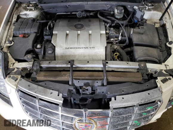 2008 Cadillac DTS 1SA z VIN 1G6KD57YX8U180665, wystawiony jako Copart lot #52109515 z przebiegiem 119 138 mil mil oraz Szkody całkowita. Historia ofert i sprzedaży dostępna na DreamBid. Obrazek 11.