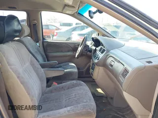 2001 Toyota Sienna LE with VIN 4T3ZF13C21U352205, listed as a IAAI auction lot 41904160 with 185,293 mi miles. Bid and sale history available at carsss.com. Image 5.
