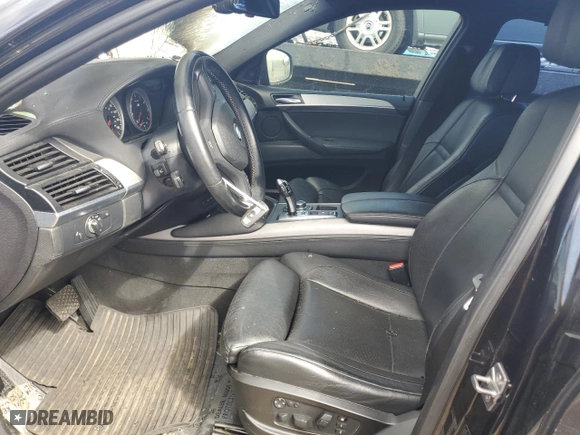 2011 BMW X6 M with VIN 5YMGZ0C54BLK13876, listed as a Copart auction lot 68567774 with 0 mi miles and Salvage Title. Bid and sale history available at carsss.com. Image 7.